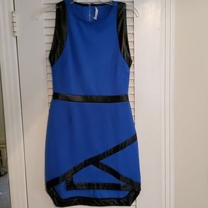 Size 4. Blue dress with black leather trim.